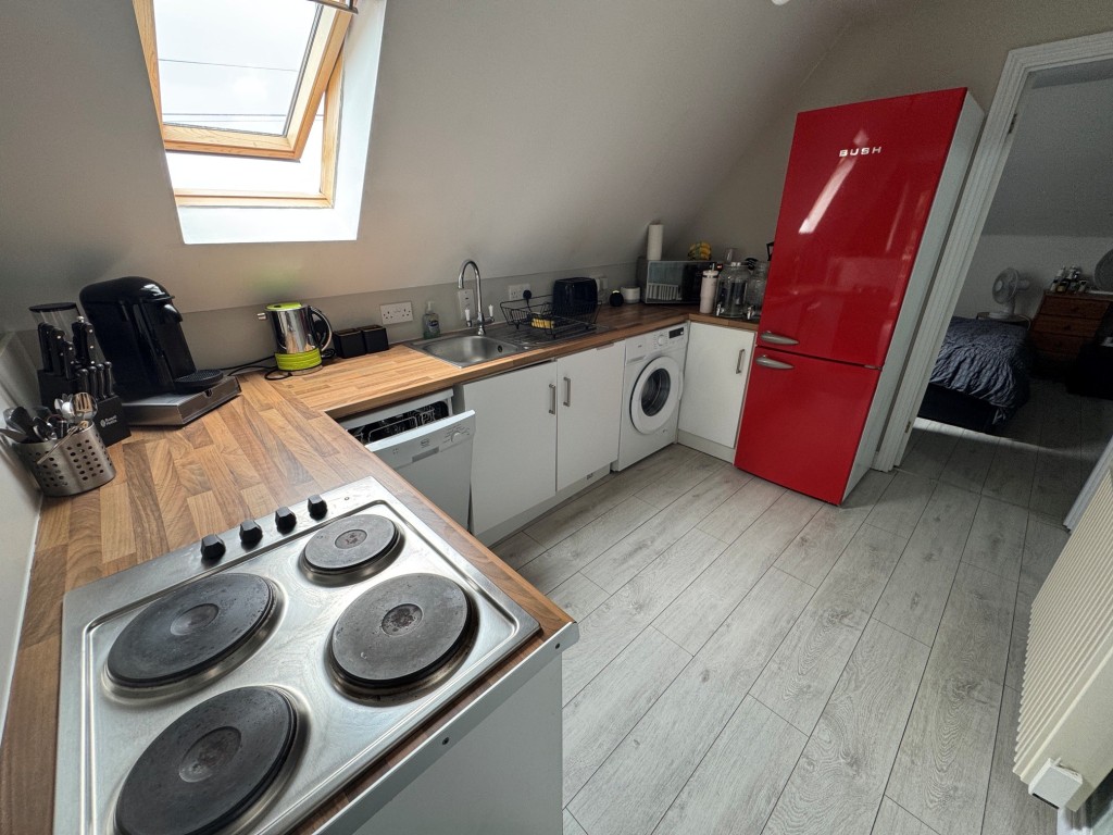 Lot: 144 - FREEHOLD DETACHED PERIOD FARMHOUSE, STUDIO APARTMENT OVER QUADRUPLE GARAGE - RESIDENTIAL INVESTMENT - Studio - kitchen area